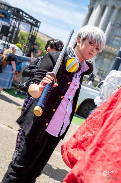 Photo by Christopher Pang / ChrisPang Productions. A cosplayer in a blue and white dress, at the NorCal Cherry Blossom Festival cosplay parade.