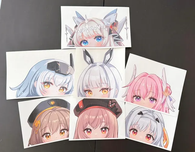 Merch example by Nekopon. A sticker sheet of a woman with long pink hair in a white and blue outfit.