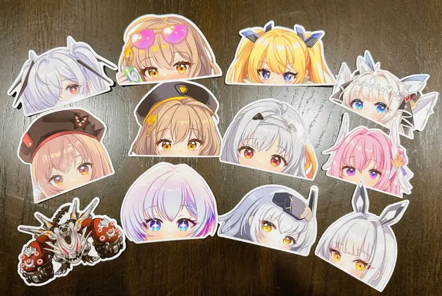 Merch example by Nekopon. A wide print of two women, one with pink hair in white and blue, one with dark hair in black.